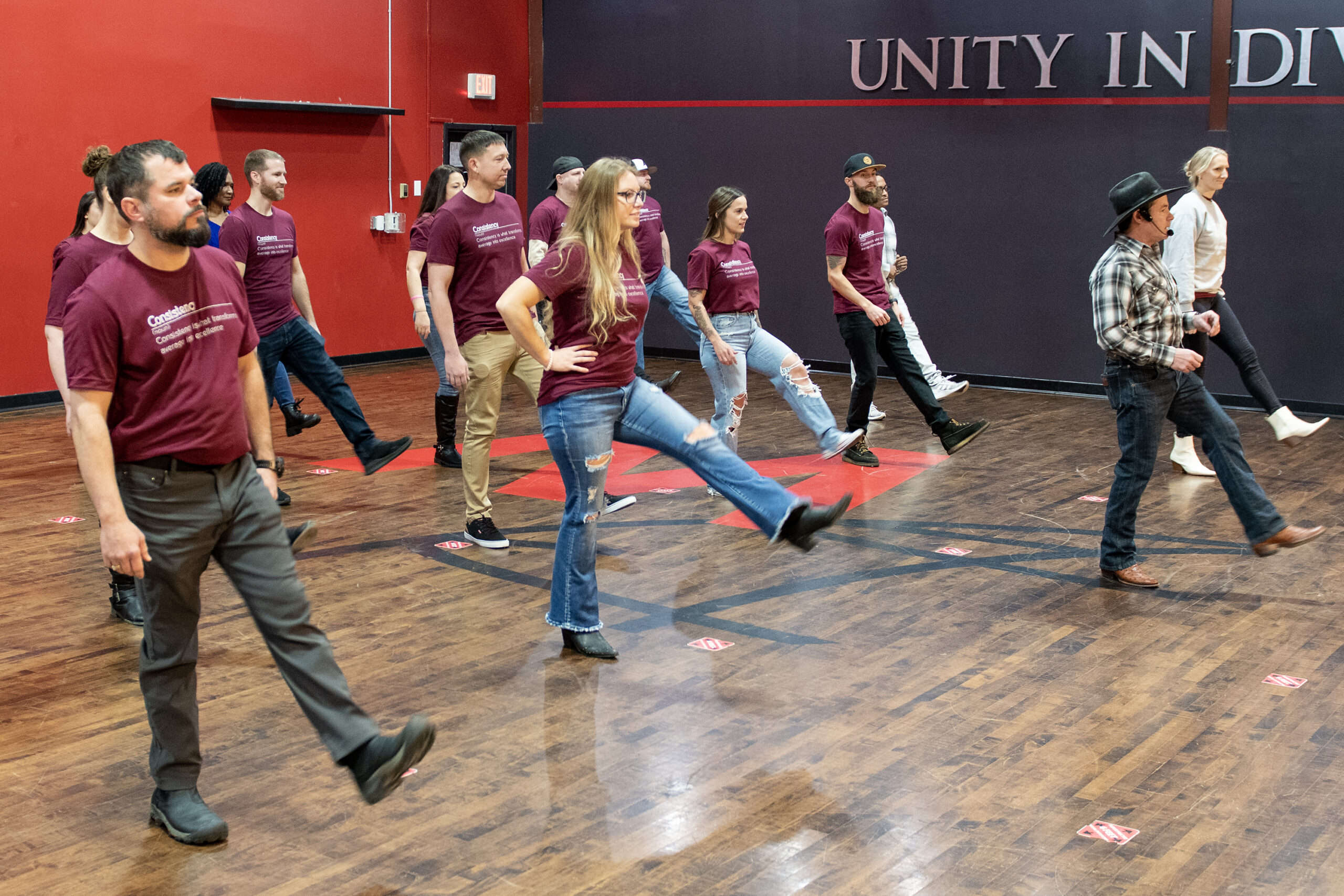 Company having a line dance lesson in Nashville