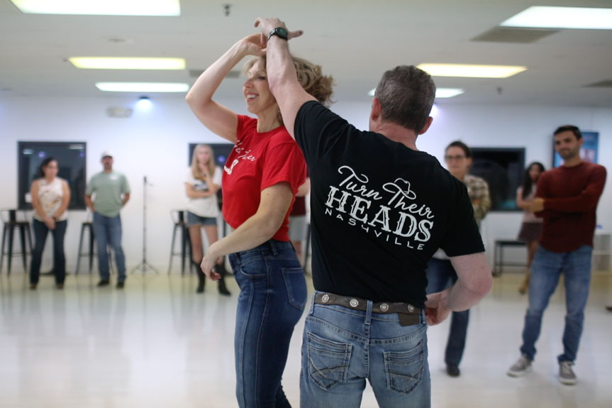 Rick and Nicole demonstrating a country swing spin