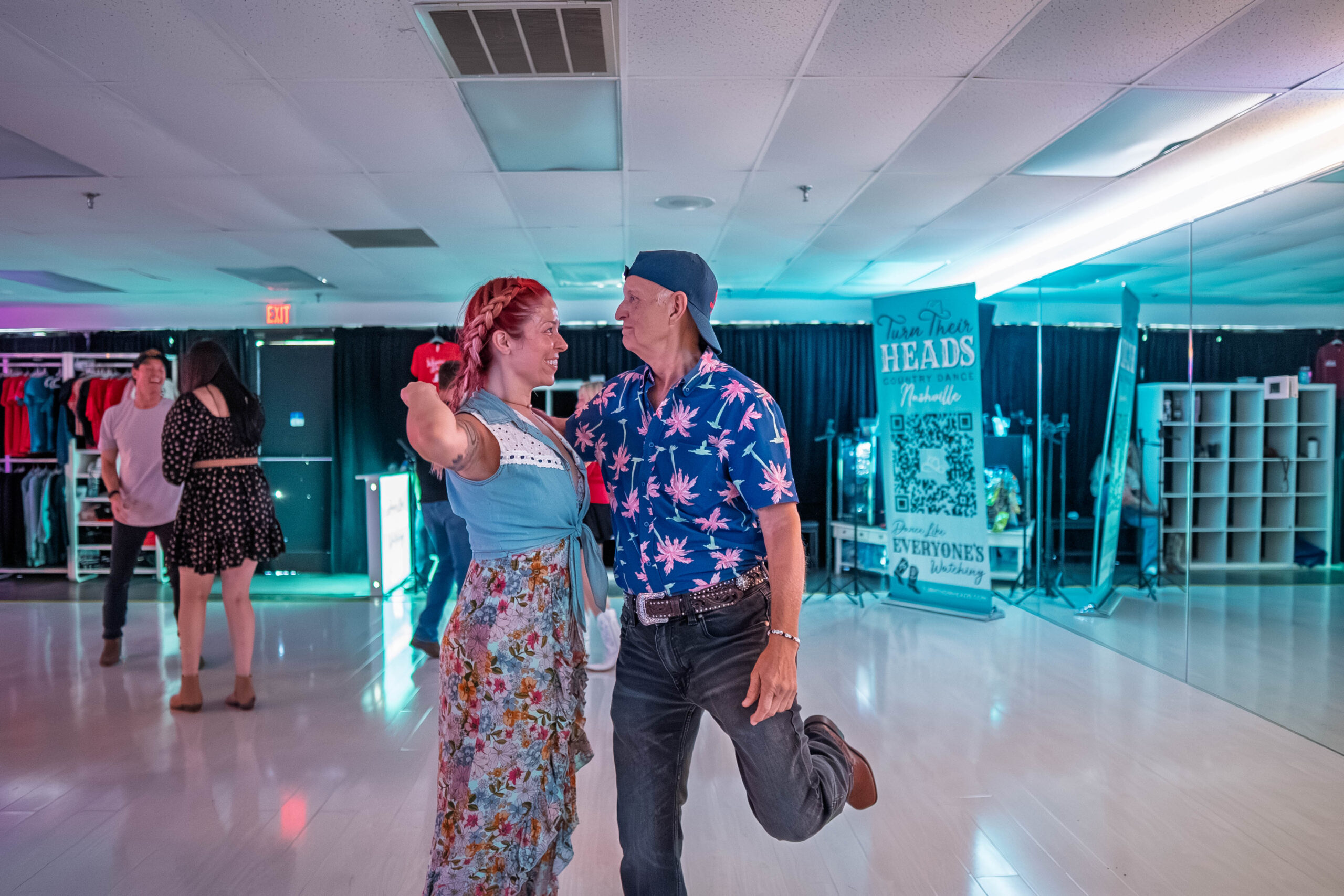 Couple doing a country Texas two step lesson